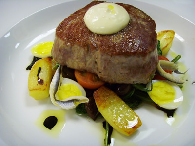 Tuna Nicoise - With Green Beans, Quail Egg,Cherry Tomato, Olives , Anchovie Fillets , Arugula Leaves , Udos Oil , Balsamic Reduction 